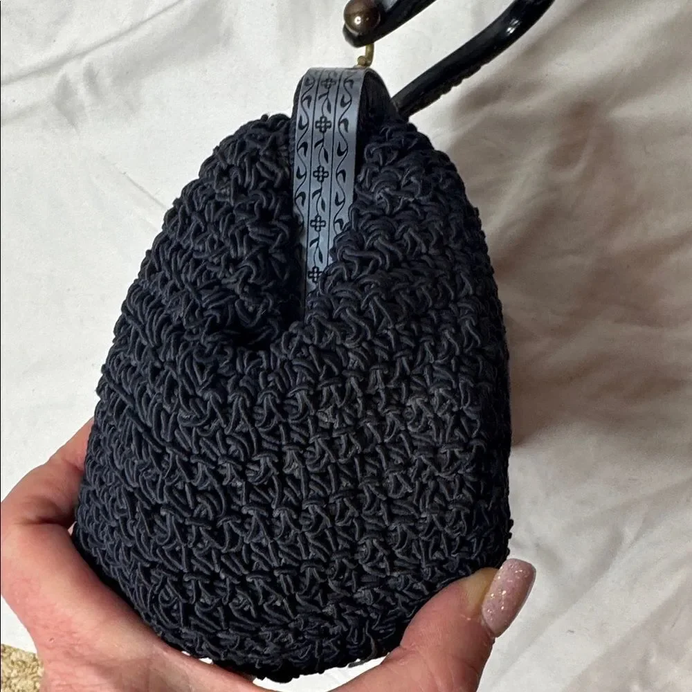 Vintage 60’s Black Knit Dumpling Bag With Silver And Gold Fixtures.